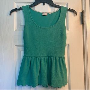 XS green peplum top with open back